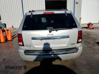 2010 Jeep Grand Cherokee Limited z VIN 1J4RR5GT4AC145692, wystawiony jako Copart lot #75649614 z przebiegiem 99 362 mil mil oraz Szkoda całkowita • Salvage title. Historia ofert i sprzedaży dostępna na DreamBid. Obrazek 6.