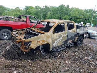 2019 Chevrolet Colorado 4WD LT z VIN 1GCGTCEN5K1280135, wystawiony jako IAAI lot #42341598 z przebiegiem Nie podano mil oraz . Historia ofert i sprzedaży dostępna na DreamBid. Obrazek 2.