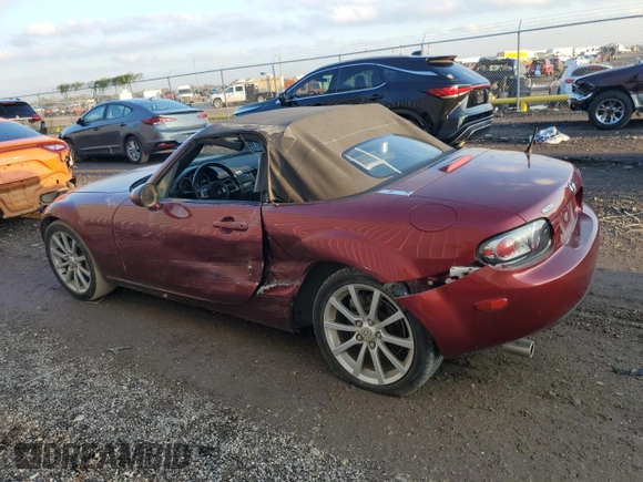 2007 Mazda MX-5 Miata Sport z VIN JM1NC25F970124896, wystawiony jako Copart lot #83624394 z przebiegiem 62 735 mil mil oraz Szkoda całkowita • Salvage title. Historia ofert i sprzedaży dostępna na DreamBid. Obrazek 2.