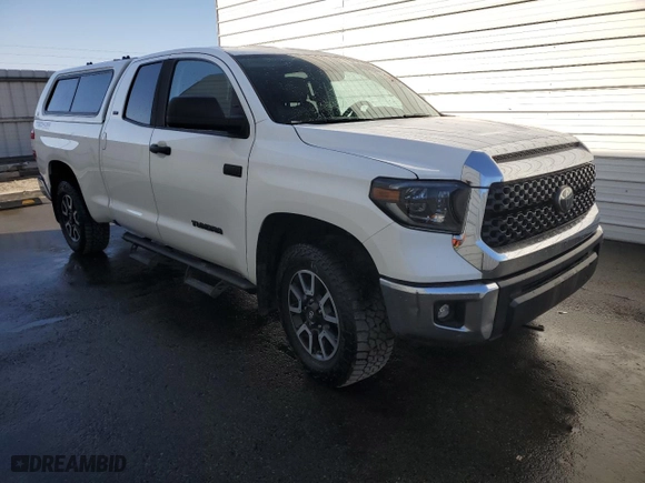 2020 Toyota Tundra 4WD SR with VIN 5TFUY5F17LX906407, listed as a Copart auction lot 87609395 with 95,315 mi miles and Clean Title. Bid and sale history available at carsss.com. Image 4.