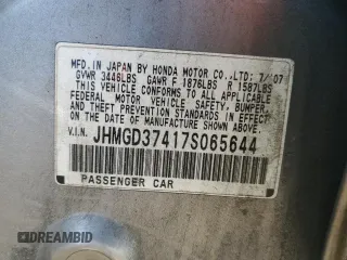 2007 Honda Fit z VIN JHMGD37417S065644, wystawiony jako Copart lot #41787565 z przebiegiem 125 745 mil mil oraz Szkoda całkowita • Salvage title. Historia ofert i sprzedaży dostępna na DreamBid. Obrazek 12.