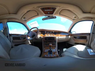 1999 Bentley Arnage z VIN SCBLB51E1XCX01401, wystawiony jako IAAI lot #42133144 z przebiegiem 29 699 mil mil oraz . Historia ofert i sprzedaży dostępna na DreamBid. Obrazek 18.