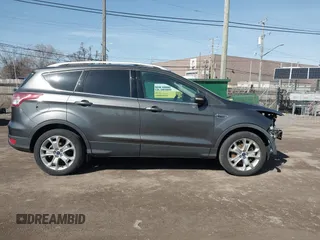 2016 Ford Escape Titanium with VIN 1FMCU9JX5GUA65412, listed as a IAAI auction lot 41859123 with 80,208 mi miles and . Bid and sale history available at DreamBid. Image 13.