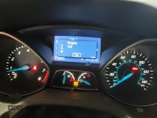 2013 Ford Focus SE with VIN 1FADP3F21DL348827, listed as a Copart auction lot 63589405 with 144,156 mi miles and Salvage title. Bid and sale history available at DreamBid. Image 9.
