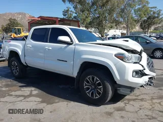2020 Toyota Tacoma SR5 z VIN 3TMCZ5AN9LM341778, wystawiony jako IAAI lot #42268274 z przebiegiem 64 767 mil mil oraz . Historia ofert i sprzedaży dostępna na DreamBid. Obrazek 1.