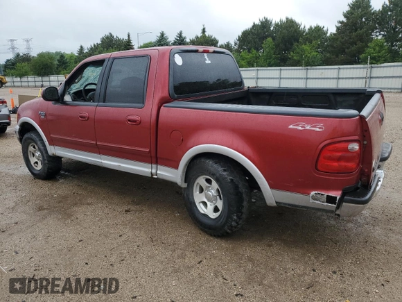 2001 Ford F-150 XLT with VIN 1FTRW08L41KB01407, listed as a Copart auction lot 59446555 with 285,312 mi miles and Salvage title. Bid and sale history available at DreamBid. Image 2.