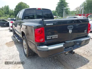 2007 Dodge Dakota SLT z VIN 1D7HW48P27S198997, wystawiony jako IAAI lot #42411491 z przebiegiem 183 825 mil mil oraz . Historia ofert i sprzedaży dostępna na DreamBid. Obrazek 6.