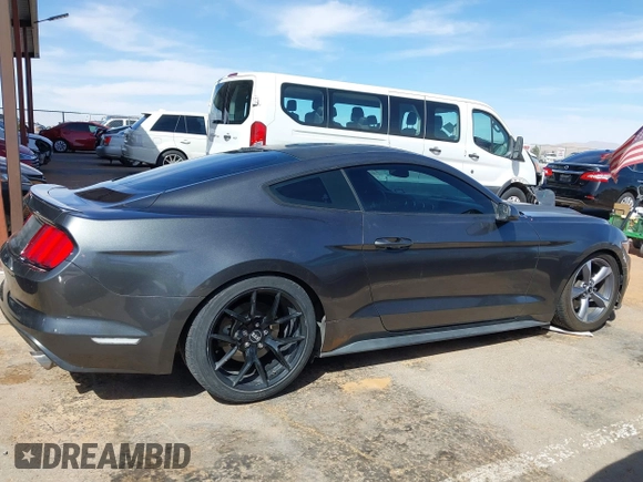 2015 Ford Mustang V6 with VIN 1FA6P8AM5F5318400, listed as a IAAI auction lot 41812625 with 97,728 mi miles and . Bid and sale history available at DreamBid. Image 13.