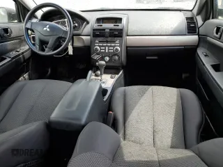 2012 Mitsubishi Galant FE z VIN 4A32B2FF1CE019686, wystawiony jako Copart lot #55268385 z przebiegiem 194 351 mil mil oraz Szkoda całkowita • Salvage title. Historia ofert i sprzedaży dostępna na DreamBid. Obrazek 8.