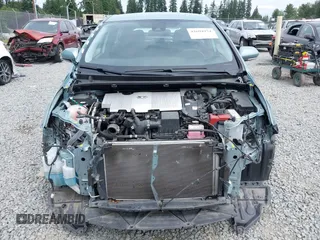 2020 Toyota Prius LE with VIN JTDL9RFU1L3017670, listed as a IAAI auction lot 42694974 with 69,298 mi miles and . Bid and sale history available at DreamBid. Image 6.