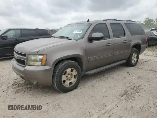 2011 Chevrolet Suburban LT with VIN 1GNSCJE00BR396287, listed as a Copart auction lot 51642665 with 219,648 mi miles and Salvage Title. Bid and sale history available at carsss.com. Image 1.