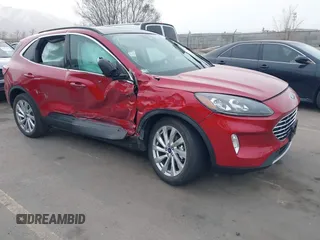 2021 Ford Escape Titanium Hybrid with VIN 1FMCU9DZ1MUA01599, listed as a IAAI auction lot 41912441 with 20,660 mi miles and . Bid and sale history available at DreamBid. Image 1.