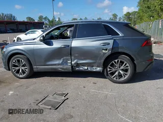 2021 Audi Q8 Premium Plus z VIN WA1EVAF15MD035056, wystawiony jako IAAI lot #41534412 z przebiegiem 65 579 mil mil oraz . Historia ofert i sprzedaży dostępna na DreamBid. Obrazek 15.
