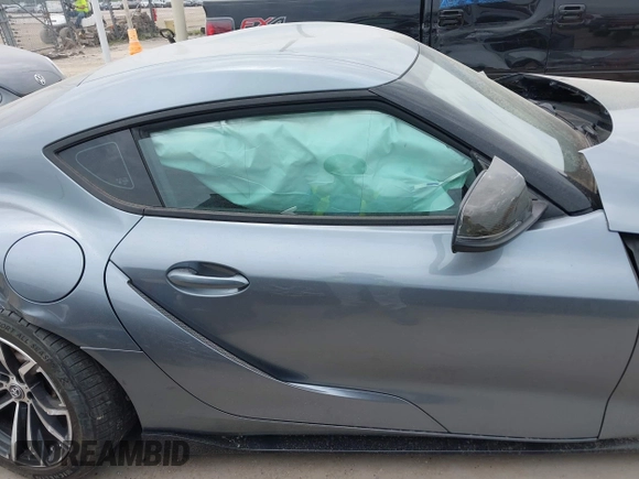 2021 Toyota Supra 2.0 with VIN WZ1DB2C0XMW038679, listed as a IAAI auction lot 42407988 with 76,316 mi miles and . Bid and sale history available at DreamBid. Image 14.