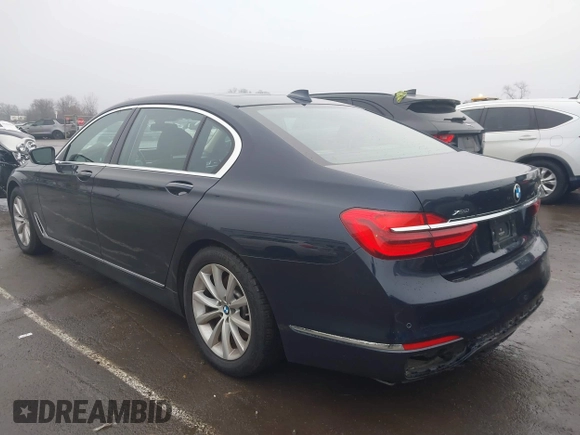 2019 BMW 7 Series 740i xDrive with VIN WBA7E4C52KGV70359, listed as a IAAI auction lot 41421504 with 55,734 mi miles and . Bid and sale history available at carsss.com. Image 3.
