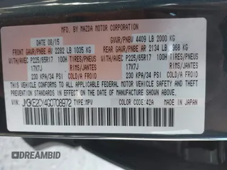 2016 Mazda CX-5 Touring z VIN JM3KE2CY4G0708972, wystawiony jako IAAI lot #42043013 z przebiegiem 157 573 mil mil oraz . Historia ofert i sprzedaży dostępna na DreamBid. Obrazek 9.