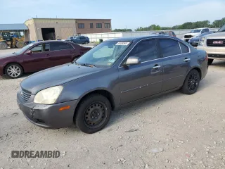 2006 Kia Optima LX z VIN KNAGE123665060256, wystawiony jako Copart lot #64469565 z przebiegiem 175 944 mil mil oraz Szkoda całkowita • Salvage title. Historia ofert i sprzedaży dostępna na DreamBid. Obrazek 1.