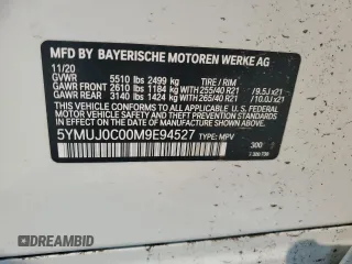2021 BMW X4 M z VIN 5YMUJ0C00M9E94527, wystawiony jako Copart lot #69607414 z przebiegiem Nie podano mil oraz Szkoda całkowita • Salvage title. Historia ofert i sprzedaży dostępna na DreamBid. Obrazek 13.