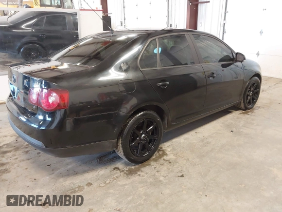 2008 Volkswagen Jetta Sedan S with VIN 3VWJM71K78M153658, listed as a IAAI auction lot 41709377 with 144,467 mi miles. Bid and sale history available at carsss.com. Image 4.