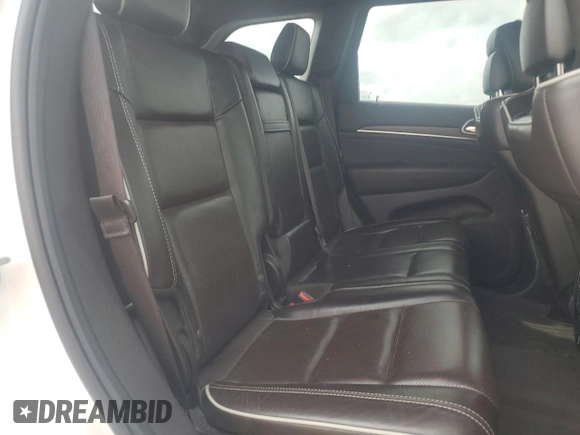 2018 Jeep Grand Cherokee Overland with VIN 1C4RJFCG5JC437508, listed as a Copart auction lot 51814795 with 104,598 mi miles and Salvage title. Bid and sale history available at DreamBid. Image 11.