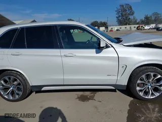 2018 BMW X5 xDrive40e iPerformance with VIN 5UXKT0C53J0W00910, listed as a IAAI auction lot 41842046 with 48,838 mi miles. Bid and sale history available at carsss.com. Image 13.