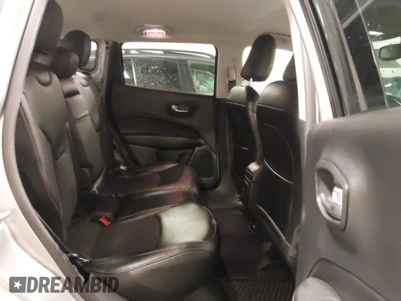 2019 Jeep Compass Latitude with VIN 3C4NJDBB6KT812711, listed as a IAAI auction lot 41565166 with 69,582 mi miles and . Bid and sale history available at carsss.com. Image 8.