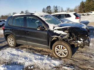 2017 Volkswagen Tiguan S with VIN WVGAV7AX8HK028148, listed as a Copart auction lot 86756104 with 84,060 mi miles and Salvage Title. Bid and sale history available at DreamBid. Image 4.
