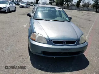 1998 Honda Civic DX with VIN JHMEJ6624WS000450, listed as a Copart auction lot 54217265 with 299,994 mi miles and Salvage Title. Bid and sale history available at carsss.com. Image 13.