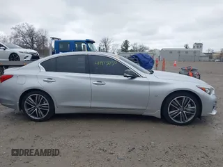 2014 Infiniti Q50 Sport with VIN JN1BV7AR2EM706535, listed as a IAAI auction lot 41919050 with 129,739 mi miles and . Bid and sale history available at DreamBid. Image 14.