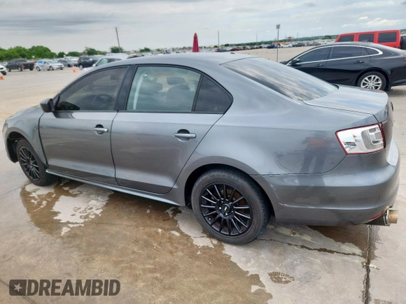 2014 Volkswagen Jetta S with VIN 3VW2K7AJ4EM226580, listed as a Copart auction lot 58539055 with 138,927 mi miles and Salvage title. Bid and sale history available at DreamBid. Image 2.