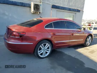 2014 Volkswagen CC Lux with VIN WVWRN7AN2EE519119, listed as a Copart auction lot 84211874 with 116,846 mi miles and Clean Title. Bid and sale history available at carsss.com. Image 3.