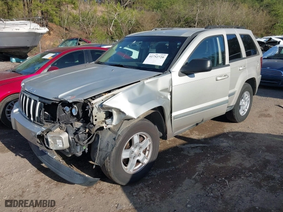 2007 Jeep Grand Cherokee Laredo with VIN 1J8GS48K17C516150, listed as a IAAI auction lot 41752720 with 176,114 mi miles. Bid and sale history available at carsss.com. Image 17.