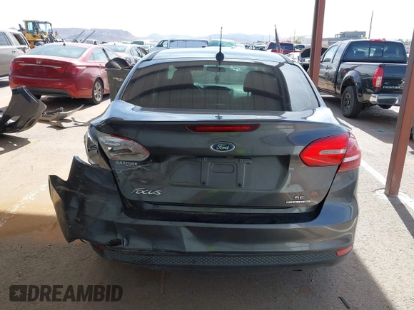 2015 Ford Focus SE with VIN 1FADP3F27FL374531, listed as a IAAI auction lot 42123579 with 128,884 mi miles and . Bid and sale history available at DreamBid. Image 16.
