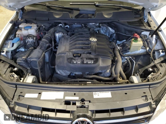 2012 Volkswagen Touareg Exec with VIN WVGEF9BP4CD011823, listed as a Copart auction lot 84063034 with 110,694 mi miles and Non Repairable. Bid and sale history available at DreamBid. Image 12.