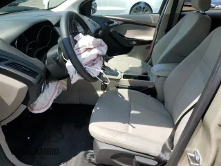 2018 Ford Focus SE z VIN 1FADP3F23JL303948, wystawiony jako Copart lot #55698915 z przebiegiem 85 500 mil mil oraz Szkoda całkowita • Salvage title. Historia ofert i sprzedaży dostępna na DreamBid. Obrazek 7.