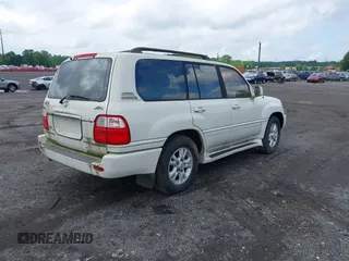 2001 Lexus LX 470 z VIN JTJHT00W613506010, wystawiony jako IAAI lot #42277268 z przebiegiem 186 671 mil mil oraz . Historia ofert i sprzedaży dostępna na DreamBid. Obrazek 4.