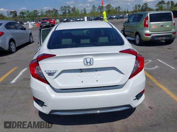 2020 Honda Civic LX with VIN 2HGFC2F61LH568767, listed as a IAAI auction lot 41909755 with 56,213 mi miles and . Bid and sale history available at DreamBid. Image 17.