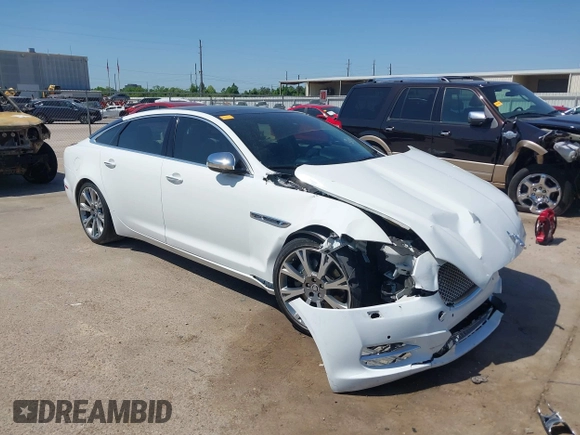 2012 Jaguar XJ XJL with VIN SAJWA2GB3CLV38500, listed as a IAAI auction lot 41990409 with 73,793 mi miles and . Bid and sale history available at DreamBid. Image 1.