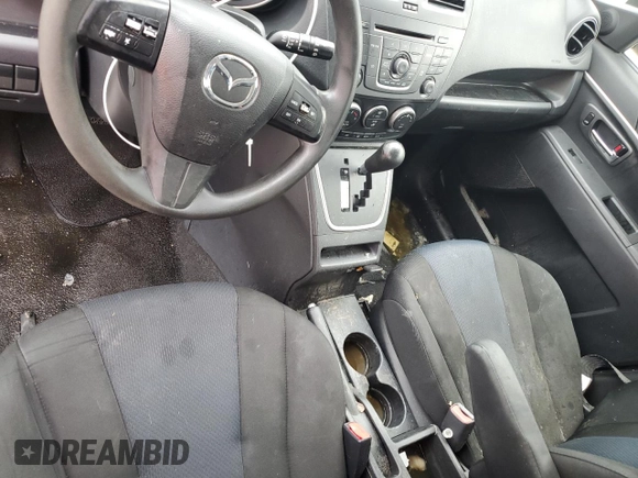 2015 Mazda 5 Sport with VIN JM1CW2BL4F0181398, listed as a Copart auction lot 65275874 with 152,749 mi miles and Salvage Title. Bid and sale history available at DreamBid. Image 8.