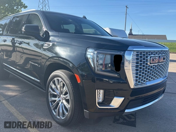 2021 GMC Yukon XL Denali with VIN 1GKS2JKL4MR273724, listed as a Copart auction lot 55700095 with 49,015 mi miles and Clean Title. Bid and sale history available at carsss.com. Image 1.