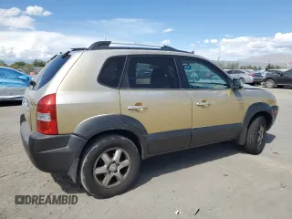 2005 Hyundai Tucson GLS with VIN KM8JN12DX5U066451, listed as a Copart auction lot 72607604 with 194,965 mi miles and Salvage Title. Bid and sale history available at carsss.com. Image 3.