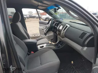 2013 Toyota Tacoma PreRunner with VIN 5TFJU4GN4DX039706, listed as a IAAI auction lot 41465806 with 126,322 mi miles. Bid and sale history available at carsss.com. Image 5.