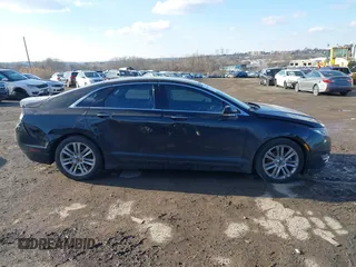 2016 Lincoln MKZ with VIN 3LN6L2J92GR618453, listed as a IAAI auction lot 41545429 with 134,229 mi miles and . Bid and sale history available at DreamBid. Image 12.