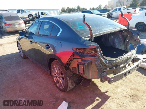2021 Mazda 3 Select with VIN JM1BPBBL0M1329224, listed as a IAAI auction lot 41348699 with 12,338 mi miles and . Bid and sale history available at carsss.com. Image 3.