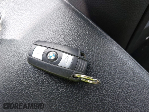 2011 BMW 3 Series 328i xDrive with VIN WBAKF5C55BE586564, listed as a IAAI auction lot 41944192 with 153,167 mi miles. Bid and sale history available at carsss.com. Image 11.