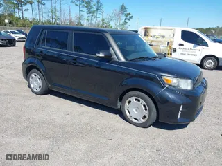 2013 Scion xB with VIN JTLZE4FE8DJ033982, listed as a IAAI auction lot 41820204 with 155,418 mi miles. Bid and sale history available at carsss.com. Image 1.