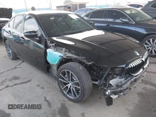 2020 BMW 3 Series 330i with VIN WBA5R1C07LFH37243, listed as a IAAI auction lot 42129217 with 22,767 mi miles. Bid and sale history available at carsss.com. Image 1.