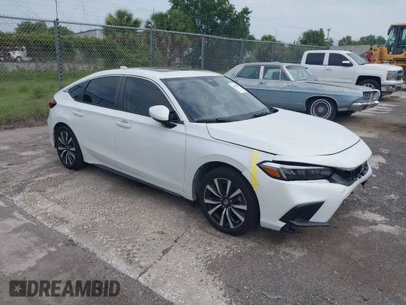 2023 Honda Civic EX-L with VIN 19XFL1H70PE014510, listed as a IAAI auction lot 42395890 with 14,163 mi miles and . Bid and sale history available at DreamBid. Image 1.