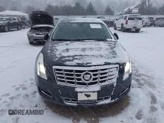 2013 Cadillac XTS with VIN 2G61N5S37D9112979, listed as a IAAI auction lot 41209826 with 83,237 mi miles. Bid and sale history available at carsss.com. Image 12.