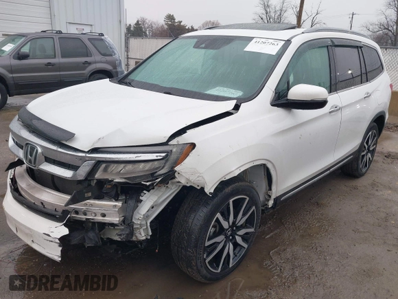 2021 Honda Pilot Touring 8-Passenger z VIN 5FNYF6H90MB031795, wystawiony jako IAAI lot #41207263 z przebiegiem 56 367 mil mil oraz . Historia ofert i sprzedaży dostępna na DreamBid. Obrazek 18.